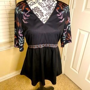 Top sized Medium. Rosewe brand.